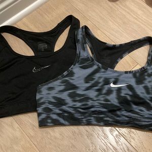 Two Nike DRI-FIT sports bras